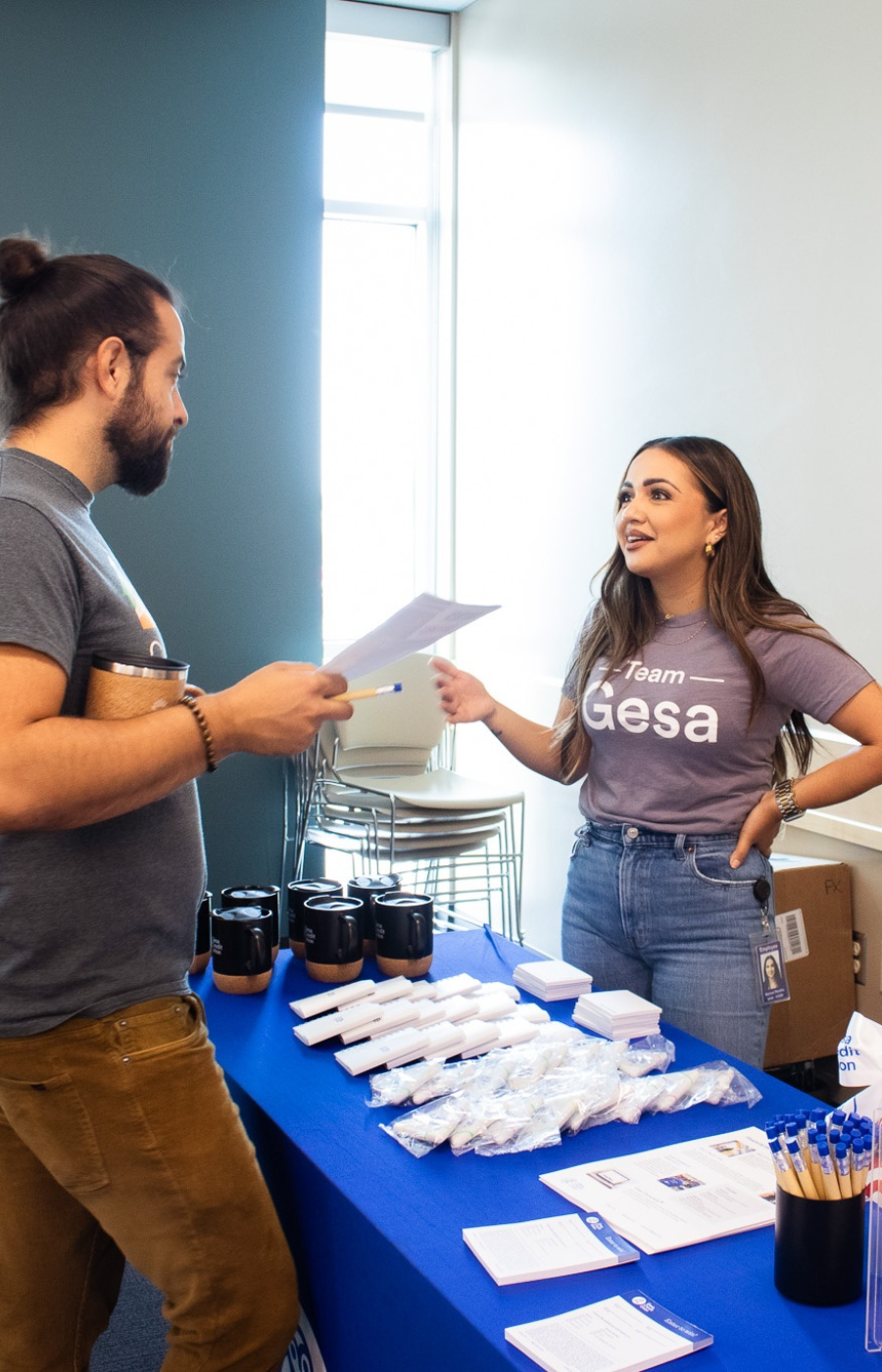 Corporate sponsor speaking at a booth event