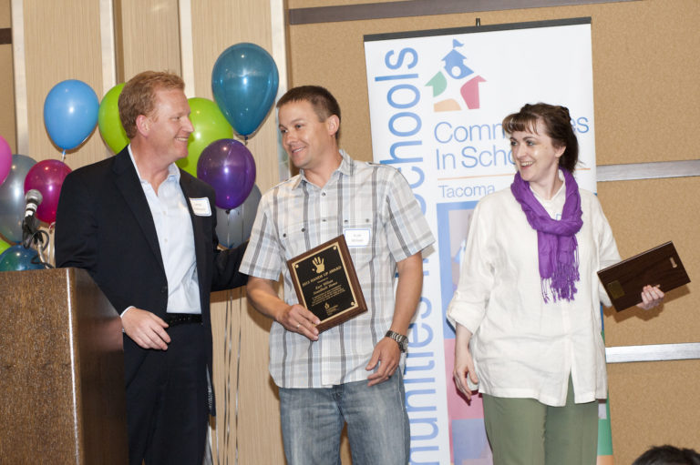 Kurt Wilson and Tiffany Speir from MBAPC receive "Hands Up" award.