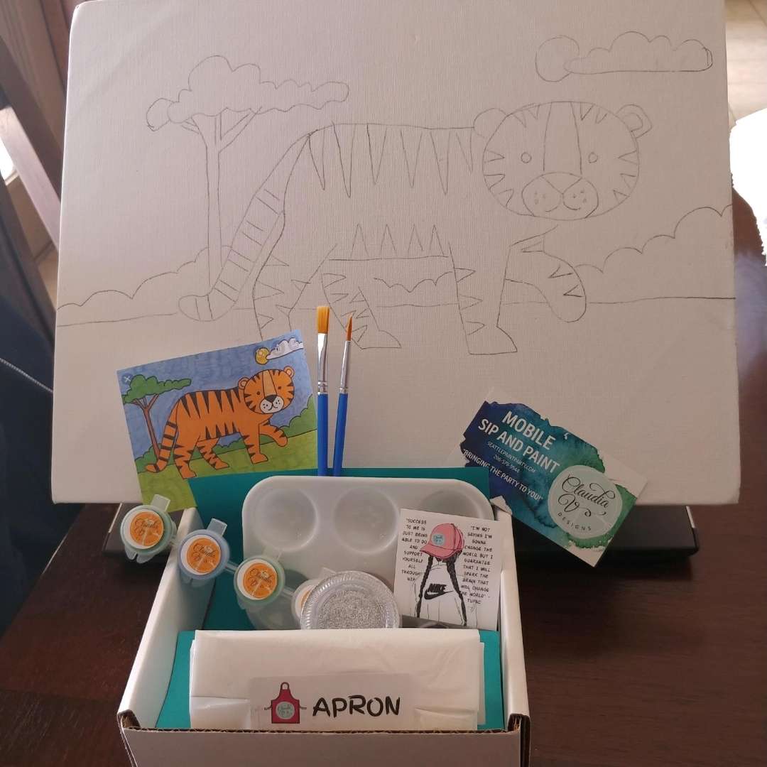 Drawing of a tiger with a box of paint supplies.